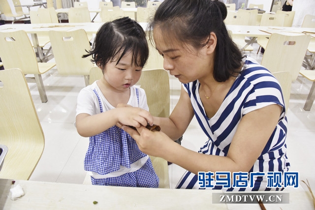 泌陽(yáng)縣法院開展包粽子比賽迎接端午節(jié)