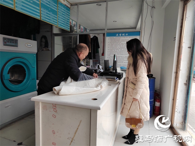 天氣轉暖干洗店生意迎來“小陽春”